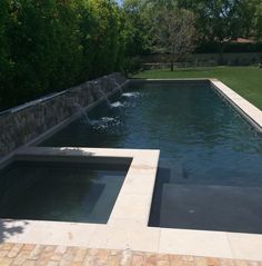 an image of a swimming pool being viewed from the side with text overlay that reads steel grey