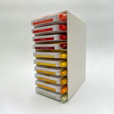 a stack of files sitting on top of a white table