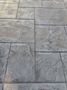 a close up view of a stone patio