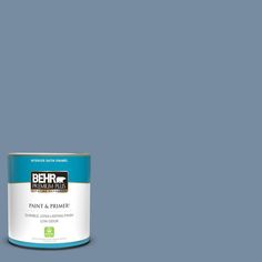 the behr paint and prime in one is light green, with a white base