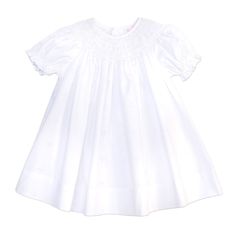 Beautiful white smocked bishop dress with short puff sleeves has detailed smocking around the neckline. Beautiful dress for Christening Baptism or Dedication. Darling baby girls day dress for coming home outfit, first portraits or any special occasion. 65% Polyester 35% Cotton Comes with a matching white bonnet with ruffle trim Elegant Smocked Dress With Smocked Cuffs For Baptism, Elegant Smocked Ruffle Dress For Baptism, Elegant Smocked Dresses For Baptism, Elegant Baptism Dress With Smocked Bodice, Elegant Fitted Baptism Dress With Smocked Bodice, White Puff Sleeve Dress For First Communion, Elegant White Smocked Dress For Baptism, Elegant Smock Dresses For Baptism, Elegant White Smocked Dress With Lace Trim