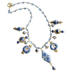 Blue and white themes are universally popular whether in interior design or jewelry. Such is the case with this whimsical and charming kyanite blue necklace. Various shades and sizes of blue and white Chinese porcelain beads are accented with unique gold vermeil findings to create this one of a kind fantasy necklace. Each of the large featured beads alternates with precious little blue and white melon shaped beads for interest. This necklace would be perfect as a year round necklace since blue a Blue And White Necklace, White Melon, Fantasy Necklace, Porcelain Beads, Round Necklace, Delft Blue, Gio Ponti, White Necklace, Modern Necklaces