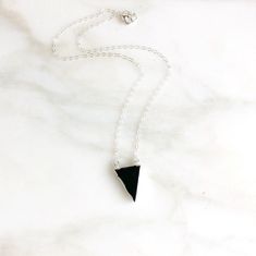 The triangle is about .75" long and the necklace is 18" long on sterling silver chain. Triangle Silver Jewelry For Party, Elegant Sterling Silver Triangle Jewelry, Minimalist Triangle Metal Necklace, Silver Triangle Metal Necklace, Nickel-free Triangle Sterling Silver Jewelry, The Necklace, Triangle Necklace, The Triangle, Gems Jewelry