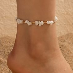 Embrace Your Bohemian Spirit Step into the warm embrace of summer with our Boho Shell Charm and Crushed Stone Anklet Set. Perfectly crafted to enhance your beach attire, this set of anklets brings a touch of bohemian elegance to any outfit. Whether you're strolling along the seashore or dancing under the stars, these anklets add a fashionable flair that celebrates your free-spirited style. Product Features Each anklet in this set is a showcase of thoughtful design and craftsmanship. Made with a tin alloy base, these pieces are adorned with charming geometric patterns and embellished with natural shell pieces and crushed stones, giving each piece a unique, artisanal feel. The anklets measure 20cm in length, ensuring a comfortable fit for all. Material: Durable metal with a tin alloy base St Bohemian Anklets As Summer Gift, Bohemian Summer Anklets As Gift, Summer Bohemian Anklets, Bohemian Ankle Wrap Jewelry For The Beach, Bohemian Ankle Wrap Jewelry For Beach, Hippie Ankle Wrap Anklets For Summer, White Ankle Wrap Anklets For Beach, Hippie Beach Ankle Wrap Anklets, Bohemian Beach Anklets