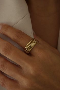 This band is the perfect blend of rugged sophistication and modern elegance. Whether you’re looking to add a touch of unique charm to your everyday style or searching for the perfect symbol of everlasting commitment, this band is your go-to. Please allow 1-2 weeks for delivery. Adjustable Gold Timeless Band, Timeless Adjustable Gold Bands, Elegant Stackable Thick Bands, Timeless Double Band Ring Jewelry, Timeless Double Band Ring With Detail, Timeless Adjustable Double Band Jewelry, Gold Adjustable Thick Band, Adjustable Thick Gold Band, Gold Thick Band With Adjustable Fit