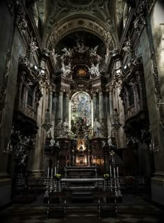 the interior of an old church with pews