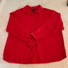 This Stylish Button Down Shirt Is Made Of 100% Cotton So It Is Breathable For Your Skin. It Is Comfortable And Also Soft To The Touch. Excellent Condition Brand New Women’s Size L We Always Try To Ship The Same Or Next Business Day! Casual Red Button-up Blouse, Classic Red Top With Placket, Red Collared Tops With Placket, Red Collared Blouse With Relaxed Fit, Red Relaxed Fit Top With Button Closure, Red Button-up Top With Buttons, Classic Red Tops With Button Cuffs, Red Cotton Tops With Snap Buttons, Red Cotton Tops With Button Cuffs