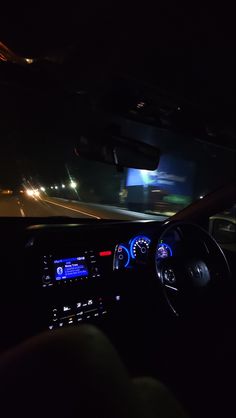 the interior of a car at night time