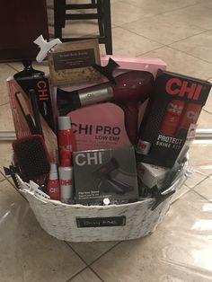 a basket filled with hair products on top of a tiled floor