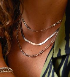 Let this stunning herringbone snake chain necklace slither around your neck as the perfect layer. A unique slinky necklace made to catch the light and shine all night.
Shop the skinny herringbone chain here.
Find the perfect necklace length here. Find our collection of necklace chains here.
Chain width: 5mm

Length: 18" Chic Herringbone Necklace With Adjustable Chain, Double Chain Snake Necklace For Layering, Snake Chain Necklace With Double Chain For Layering, Chic Snake Chain Necklace, Trendy Herringbone Necklace For Everyday, Silver Herringbone Necklace With Snake Chain, Trendy Silver Herringbone Snake Chain Necklace, Delicate Chain Herringbone Necklace For Layering, Trendy Silver Herringbone Necklace