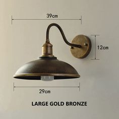 an image of a wall light with the measurements for it's size and width