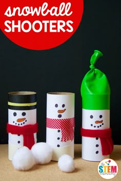 snowman shooters made out of toilet paper rolls, with the words snowball shooters on them