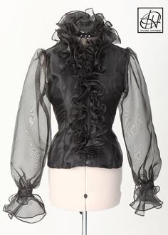 Black Organza Endless Ruffle Blouse Elegant Blouse With Ruffled Collar And Ruffle Hem, Gothic Formal Tops With Ruffles, Gothic Ruffled Blouse For Spring, Spring Gothic Blouse With Ruffles, Elegant Fitted Top With Ruffled Collar, Elegant Fitted Tops With Ruffled Collar, Formal Blouse With Ruffles And Ruffled Collar, Fitted Ruffle Hem Blouse For Party, Fitted Blouse With Ruffle Hem For Party