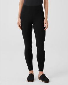 Everyday essential leggings, featuring the support of a high waist, the comfort of a slim waistband, and the style of an ankle-baring length. Irresistibly soft, lightweight, and fluid in a body-skimming, sustainable TENCEL™ Lyocell jersey knit.  By EILEEN FISHER. Pull-on style. Athleisure Activewear With Elastic Waistband And Minimal Stretch, Minimal Stretch Elastane Yoga Pants Athleisure, Minimal Stretch Athleisure Yoga Pants In Elastane, Minimal Stretch Elastane Yoga Pants For Athleisure, Athleisure Yoga Pants With Minimal Stretch In Elastane, High Rise Compressive Elastane Pants, Compressive Mid-rise Elastane Tights, Compressive Elastane Tights With Elastic Waistband, Minimal Stretch Yoga Pants For Pilates