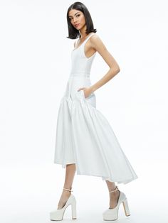 Diana Sleeveless Structured Midi Dress In Off White Midi Wedding Dress With Ruffled Skirt, Wedding Midi Dress With Ruffled Skirt, Midi Length Wedding Dress With Ruffled Skirt, Elegant Tiered Skirt Dress With Gathered Details, Elegant Tiered Dress With Gathered Skirt, Fitted Maxi Dress With Ruffle Hem And Tiered Skirt, Fitted Feminine Midi Dress With Ruffled Skirt, Fitted Tiered Skirt Midi Dress For Brunch, Fitted Tiered Maxi Dress For Brunch