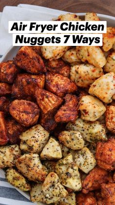 a white bowl filled with cooked potatoes on top of a blue and white towel