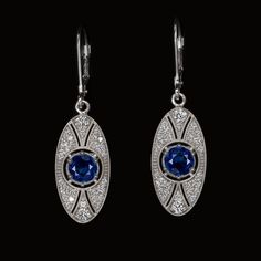 These elegant vintage style sapphire and diamond earrings have a romantic design inspired by Edwardian era touches! The oval design glitters with 0.55ct of vibrant natural diamonds which serve as the perfect backdrop for the rich blue sapphires. Graceful and luxurious, these timelessly glamorous and elegant earrings would make a splendid treat for yourself or an excellent gift for an anniversary or special occasion! The sapphires are a well saturated blue hue. The diamonds are brilliantly white, Saturated Blue, Sapphire And Diamond Earrings, Vintage Style Earrings, Sapphire Color, Romantic Design, Edwardian Era, Style Earrings, Sapphire Diamond, Elegant Earrings