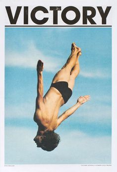 the front cover of victory magazine showing a man in black swimsuit doing a handstand