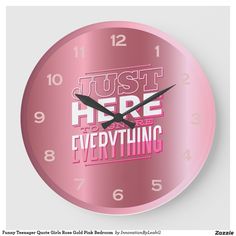 a pink clock that says just here is everything