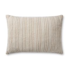 a beige striped pillow on a white background