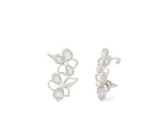 Kate Spade New York Precious Bloom Ear Pins - Earring : Clear/Silver : Embrace the allure of exquisite and charming Kate Spade New York Precious Bloom Ear Pins with clutch back closure. Made from brass, cubic zirconia, and glass pearl. Silvertone finish. Imported. Measurements: Weight: 0.3104 oz Luxury Silver Solitaire Bridal Earring, Silver Diamond Ear Cuff For Wedding, Wedding Silver Diamond Ear Cuff, Silver Pierced Ear Cuff For Formal Occasions, Elegant White Sterling Silver Ear Cuff, Silver Cluster Earrings For Evening, Silver Fine Jewelry Cluster Earrings For Evening, Formal Silver Ear Cuff With Matching Earrings, Silver Pierced Bridal Earrings For Evening