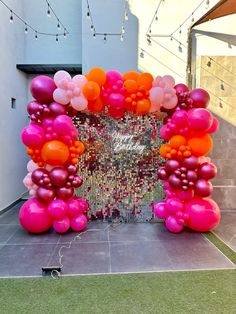 a bunch of balloons that are on the ground