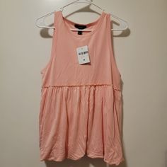 Forever 21 Sleeveless Shirt. Pink Size Medium. New With Tags. Casual Tank Vest For Summer, Summer Tank Top Vest, Trendy Spring Tank Blouse, Trendy Tank Blouse For Spring, Casual Pink Cami Blouse, Casual Cami Vest Blouse, Casual Sleeveless Spring Blouse, Spring Vacation Vest Tops, Trendy Tank Blouse For Summer