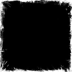 a black square with some white paint on it