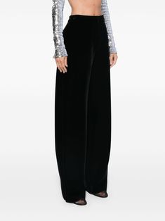 Ever had that one pair of trousers that just feels like a hug? These black high-waisted trousers might just be it, with their perfect blend of style and comfort. They’re like your wardrobe’s best-kept secret, ready to make any day a little more luxurious. Stretch-design velvet for a comfy fit Concealed front button, hook, and zip fastening High-waisted for a flattering silhouette Two side inset pockets for essentials Dart detailing for a tailored look Two rear welt pockets for added style Straig Luxury Velvet Straight Pants, Luxury Black Velvet Set, Luxury Velvet Bottoms For Workwear, Luxury Velvet Wide Leg Pants Elegant, Luxury Velvet Bottoms For Work, Luxury Velvet Workwear Bottoms, Luxury Velvet High-waisted Pants, Luxury Elegant Velvet Wide Leg Pants, Burgundy Velvet Wedding Dress Pants