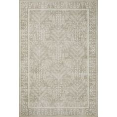 a beige rug with an intricate design on the front and back side, in neutral tones