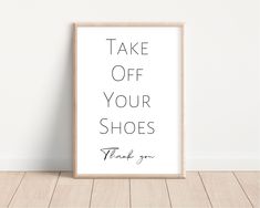 a black and white poster with the words take off your shoes thank you on it