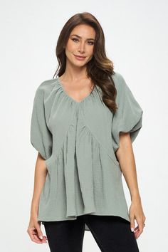 Made in USA Cotton V neck Puff Sleeve Tunic Top. Fabric content: 100% Cotton. Available in other colors. Style: casual, formal Print / Pattern: solids Silhouette: oversized Fit: oversized Neck Line: v neck Sleeve: shortsleeve Lining: no Made In: Made in U.S.AFabric Contents: 100% Cotton.Size Measurement (inch): S: 18.5 (Bust), 21.0 (Waist), 27.0 (Hips), 28.0 (Length) M: 19.5 (Bust), 22.0 (Waist), 28.0 (Hips), 28.5 (Length) L: 20.5 (Bust), 23.0 (Waist), 29.0 (Hips), 29.0 (Length) Casual Billowy V-neck Tops, Spring Oversized Blouse In Solid Color, Oversized Solid Color Blouse For Day Out, Summer Blouse With Balloon Sleeves, Solid Color Billowy Lantern Sleeve Tops, Oversized Chic Blouse For Brunch, Chic Relaxed Fit Solid Color Blouse, Billowy Lantern Sleeve Solid Tops, Billowy Lantern Sleeve Top