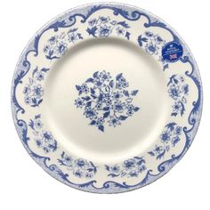 a blue and white plate with flowers on it