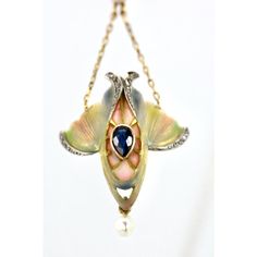 This Art Nouveau Pendant is special.  It is enameled in colors of Blue, Green, Pink and Cream. It also has a Pear shaped Blue Sapphire in the center and single cut Diamonds surround.  This shape is reminiscent of a tulip and it ends with a small natural pearl.  There is also another pearl that pulls the chain in the center.  This piece comes out of Great Britain and is lovely.  Art Nouveau necklaces are in great demand because there are few left.  This was done at the height of Art Nouveau jewelry my photos do not do it justice but we can only do the best we can.  This is priced to sell so do not wait, it will be gone. Art Deco Hallmarked Enamel Jewelry, Elegant Teardrop Enamel Jewelry, Elegant Oval Enamel Jewelry, Elegant Yellow Gold Jewelry With Artistic Design, Artistic Enamel Jewelry For Formal Occasions, Artistic Hallmarked Jewelry For Formal Occasions, Elegant Yellow Gold Jewelry With Inlay, Elegant Gold Necklace With Inlay, Elegant Enamel Jewelry With Inlay