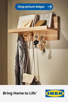 a wooden shelf with key hooks and other items hanging on it's sides, along with the words bring home to life shop picture ledges