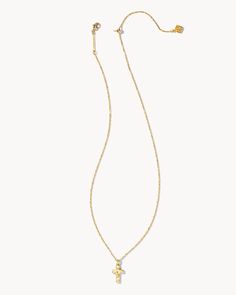 Make it personal with a symbol of what matters to you most. The Cross Pendant Necklace in Gold is a meaningful addition to your everyday collection. Size: 19" chain, 0.66"L x 0.38"W pendantClosure: Lobster clasp Skzoo Plush, Cross Necklace Simple, Kendra Scott Necklace, Gold Cross Necklace, Kendra Scott Jewelry, Gold Cross, Cross Pendant Necklace, Girly Jewelry, Stunning Necklace