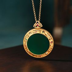 This Clouds Jade Plate Pendant Necklace is made with exquisite craftsmanship for a delicate and elegant look. It is crafted with one-of-a-kind natural jade stones to ensure long-lasting wear and unique beauty. This special necklace makes a perfect gift for any special occasion.

Natural emerald Jade stone
Chain length: 45 CM (+ 5 cm adjustable chain)
24K gold
Pendant size: 34*42mm
Adjustable lobster clasp size - one size fits all
Hypoallergenic, lead and nickel free

If you aren't in LOVE with y Green Gift, Special Necklace, Natural Gemstone Jewelry, Copper Pendant, Green Gifts, Real Stone, Natural Jade, Jade Stone, Copper Pendants