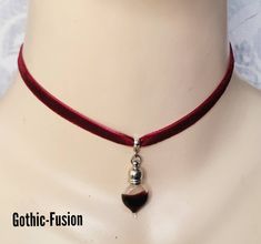 Hello, Today I have for you one of my Eternal Lovers Gothic Vampire Chokers / Collar.  Beautiful and luxurious deep claret red velvet choker finished with a miniature bottle of blood. You can also choose a black velvet choker if you prefer, from the drop down menu. Please choose the length and colour you require from the drop down menu. Each length is adjustable by a further 2". Choker width 6mm. Designed to sit around the base of the neckline, which is generally 14" ... If you require a tighter Adjustable Vampire Style Choker As Gift, Vampire Style Adjustable Choker As Gift, Adjustable Vampire Style Choker For Gift, Blood Accessories, Adjustable Black Vampire Style Necklaces, Halloween Vampire Choker Necklace, Gothic Red Necklace For Cosplay, Vampire Accessories, Blood Necklace