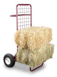 a red dolly with hay on it