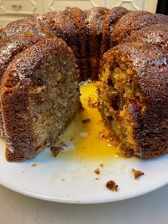 a bundt cake is cut in half on a plate