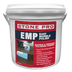 a bucket of emp polish sitting on top of a white table with the words stone pro