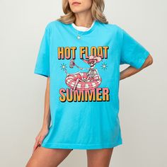 Floating the river? Enjoying the poolside? Find the perfect summer tee here! This would make a great gift for a friend or family member. Size down one for a more fitted look or up two sized for the popular oversized look! This classic unisex jersey short sleeve tee fits like a well-loved favorite. Soft cotton and quality print make users fall in love with it over and over again. These t-shirts have-ribbed knit collars to bolster shaping. The shoulders are tapered for a better fit over time. Dual Playful Graphic Print T-shirt For Vacation, Summer Graphic Print T-shirt With Relaxed Fit, Funny Blue T-shirt For Summer, Fun Spring T-shirt With Sublimation Print, Fun Beach T-shirt With Sublimation Print, Summer T-shirt With Sublimation Print And Relaxed Fit, Funny Summer Tops With Letter Print, Funny Summer T-shirt With Letter Print, Funny Letter Print Tops For Summer