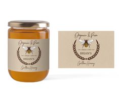 a jar of honey next to a business card