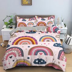 a bed room with a neatly made bed and colorful comforter set on it's side