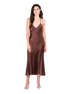 Cross our hearts and hope to slay; this sexy midi slip is no work, all play. Features a flattering deep v-neckline and sultry open-back cross strap. Love me in: Dusty Rose, Mint, Crimson, Coco, Lilac, Silver Fabric: 100% silk Dry clean only Tie Strap Dress, Blue Slip Dress, Long Midi, Timeless Dress, Silver Fabric, Midi Slip Dress, Slip Dresses, Maxi Slip Dress, Silk Slip Dress