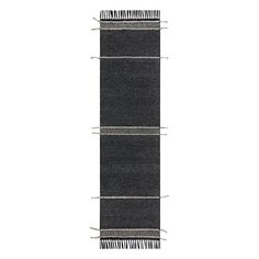 a black and white rug with fringes on the bottom, in front of a white background