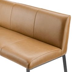 a tan leather bench with metal legs and backrests on an isolated white background