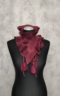 Felted wool burgundy scarf ruffle, Woolen wavy collar scarf with flowers tulips, Felt reversible lightweight floral scarf, Best gift for women This felted floral scarf with ruffle made from soft merino wool using wet felting techniquein. This felted scarf collar decorated with fiber silk and viscose. The felted scarf ruffle is very lightweight and soft. This is a reversible wool scarf ruffle - a wavy scarf that has tulip flower ties. This felt ruffle collar will complete your look. And also can