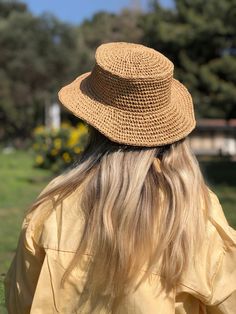 ✅I made this beautiful hat from natural paper rope. ✅The product has a standard size and the raffia rope material is flexible. ✅Handcrrafted in Turkey ✅Hand-crocheted with care 👒Straw hat, handmade and unique. For you if you want to look original and not similar to all others. ✅You can combine your clothes with a straw summer hat on summer days ✅Whether you keeping it to yourself or gifting someone you care, it will be unforgettable. ✅Foldable and easy to travel with. ✅This hat is light weight Flat Brim Paper Straw Hat For Beach Season, Natural Toquilla Straw Bucket Hat With Flat Brim, Woven Straw Brimmed Bucket Hat, Woven Straw Bucket Hat With Brim, Wide Brim Natural Woven Bucket Hat, Natural Woven Wide Brim Bucket Hat, Wide Brim Woven Bucket Hat In Natural, Natural Straw Bucket Hat With Curved Brim, Natural Woven Straw Bucket Hat