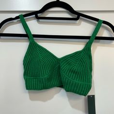 Stretchy Material Adjustable Sleeves Never Worn Chic Green Knit Crop Top, Trendy Ribbed Tops For The Beach, Casual Seamless Knit Top For Beach, Green Knit Beach Top, Trendy Green Knit Tank Top, Trendy Knit Crop Top For Vacation, Casual Knitted Crop Top For Vacation, Beach Green Knit Tops, Casual Seamless Crop Top For Vacation